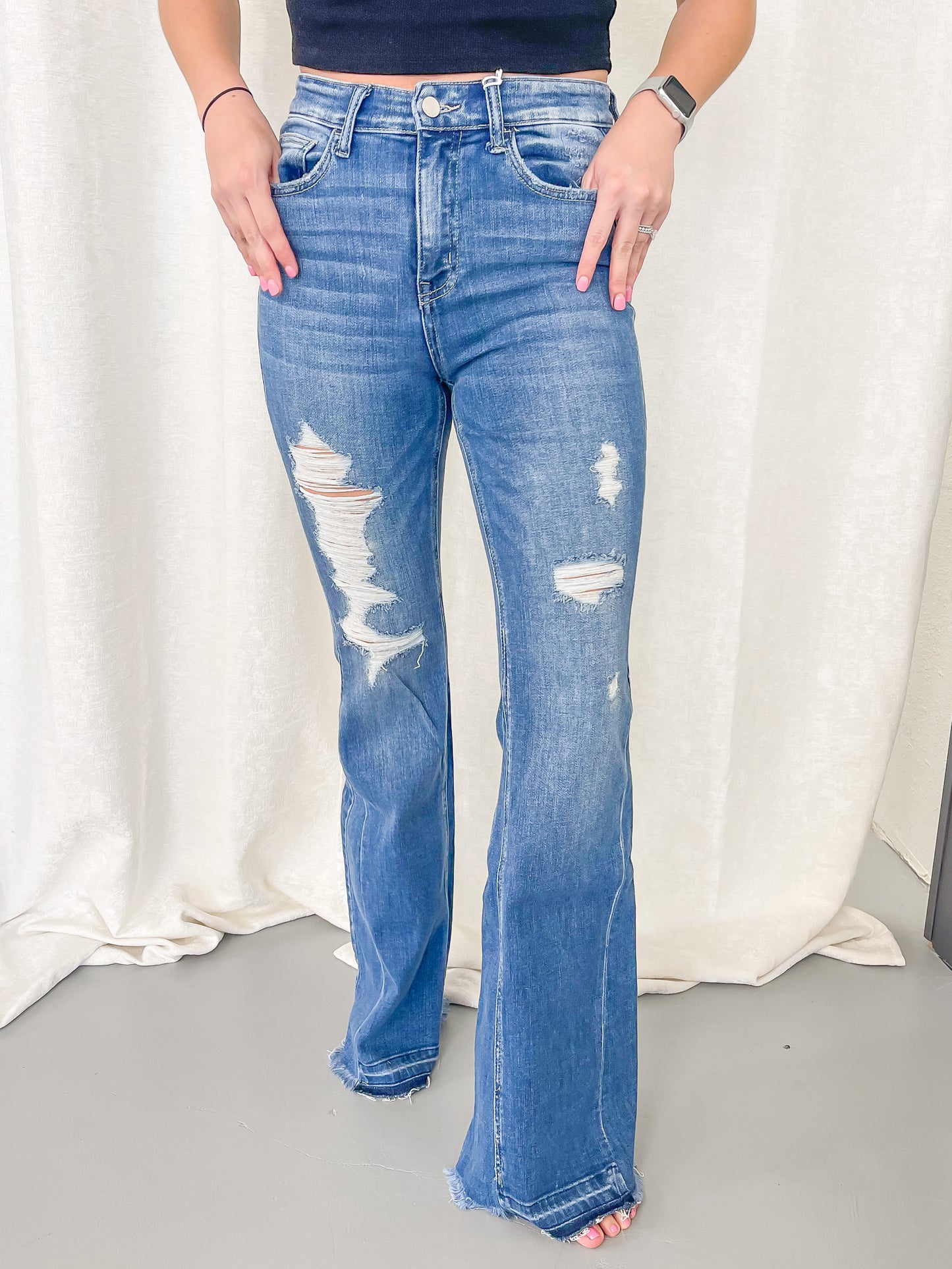 Mid Rise Distressed Flare